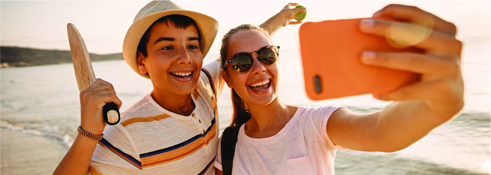 Ortho For Teens - Teens on Beach Taking Selfie